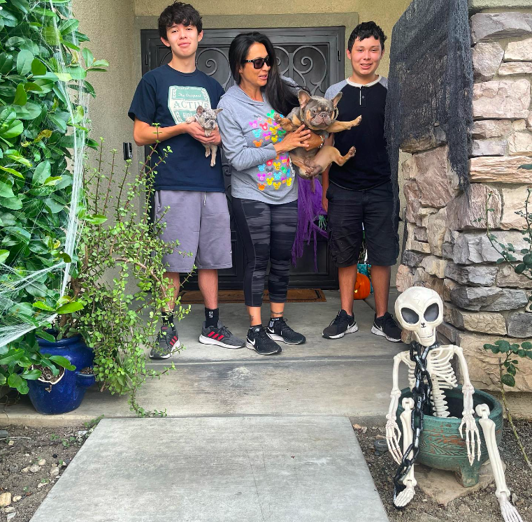 Pickup Day — A happy family welcoming home their new Frenchie